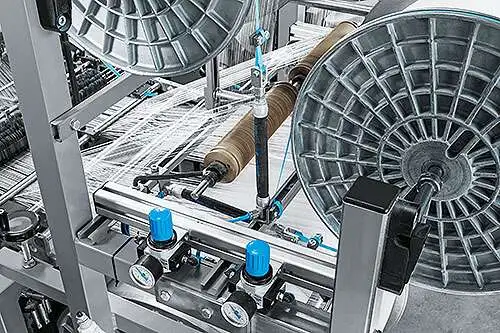 Пневматические компоненты FESTO в оборудовании для текстильной промышленности: регуляторы давления и цилиндры