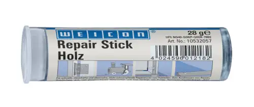 Крупный план упаковки химического средства Weicon Repair Stick Holz (дерево) в виде пластилина для быстрого ремонта и заполнения поврежденных отверстий в деревянных и ДСП поверхностях